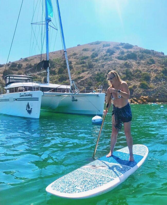 Paddleboarding next to Some Tuesday