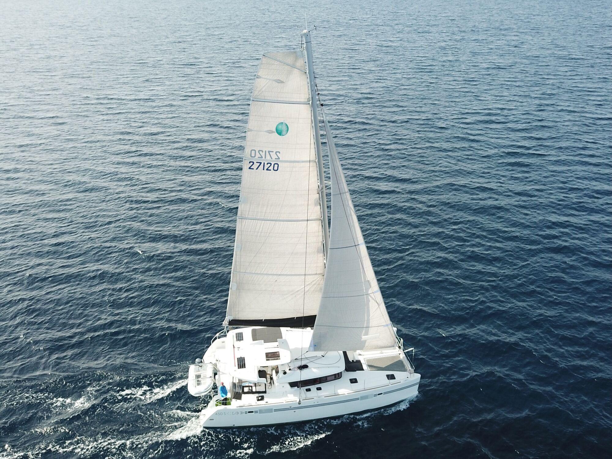 Drone view of Some Tuesday under sail on open water
