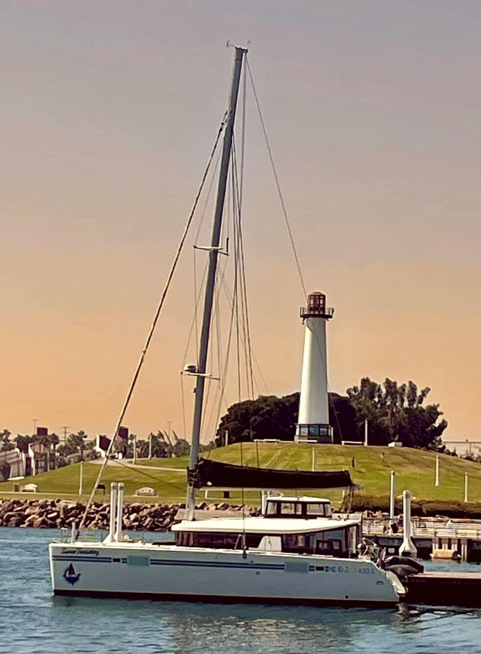 Some Tuesday at the dock by the lighthouse in Long Beach at sunset