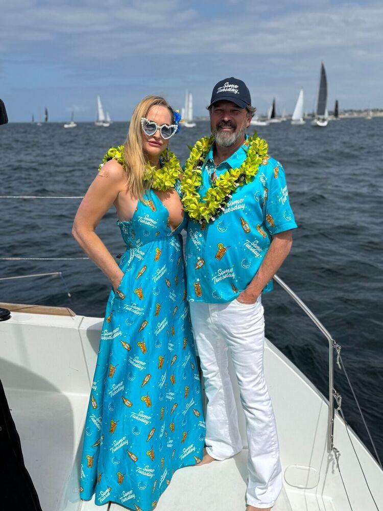 Steve and Meghan in matching Aloha-print outfits with leis at N2E 2025