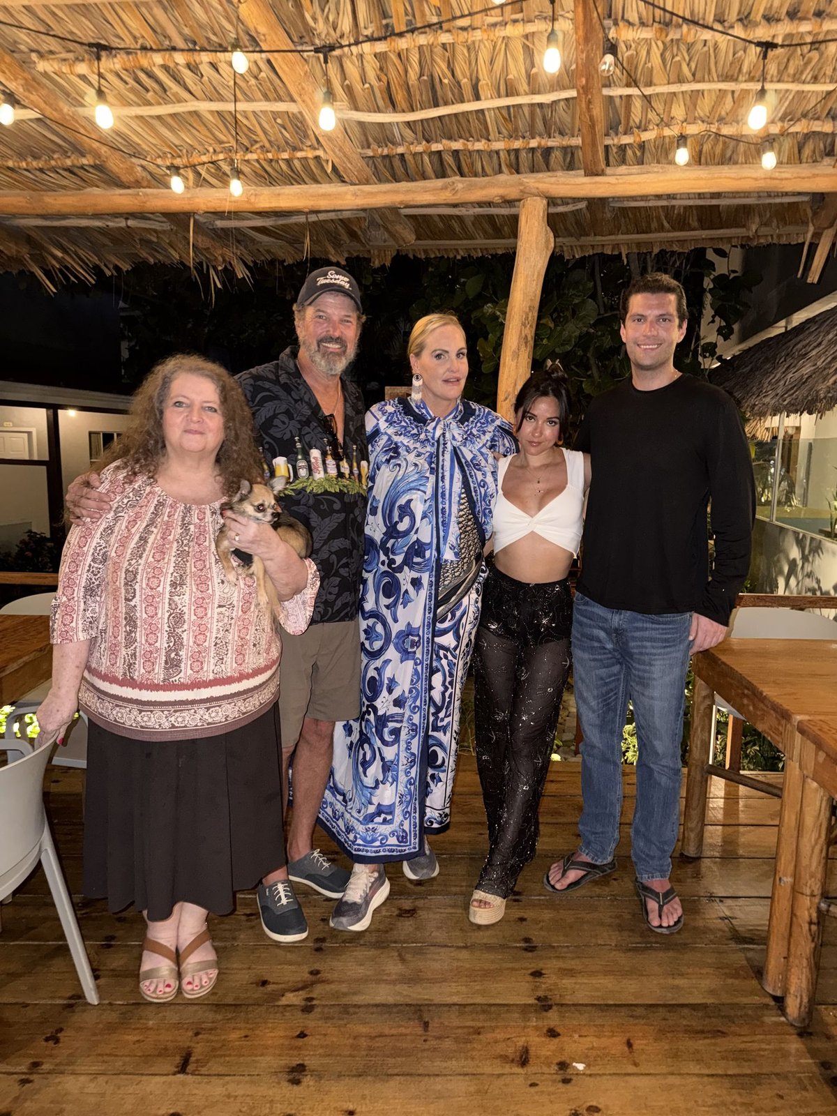 Jackie, Captain Steve, First Mate Meg, Herbert, and Dani, left to right, at an outdoor table at La Guitarra in El Tunco