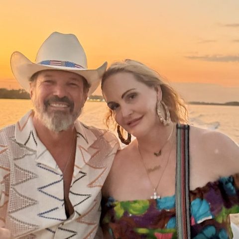 Meghan and Steve on the water at sunset in El Salvador
