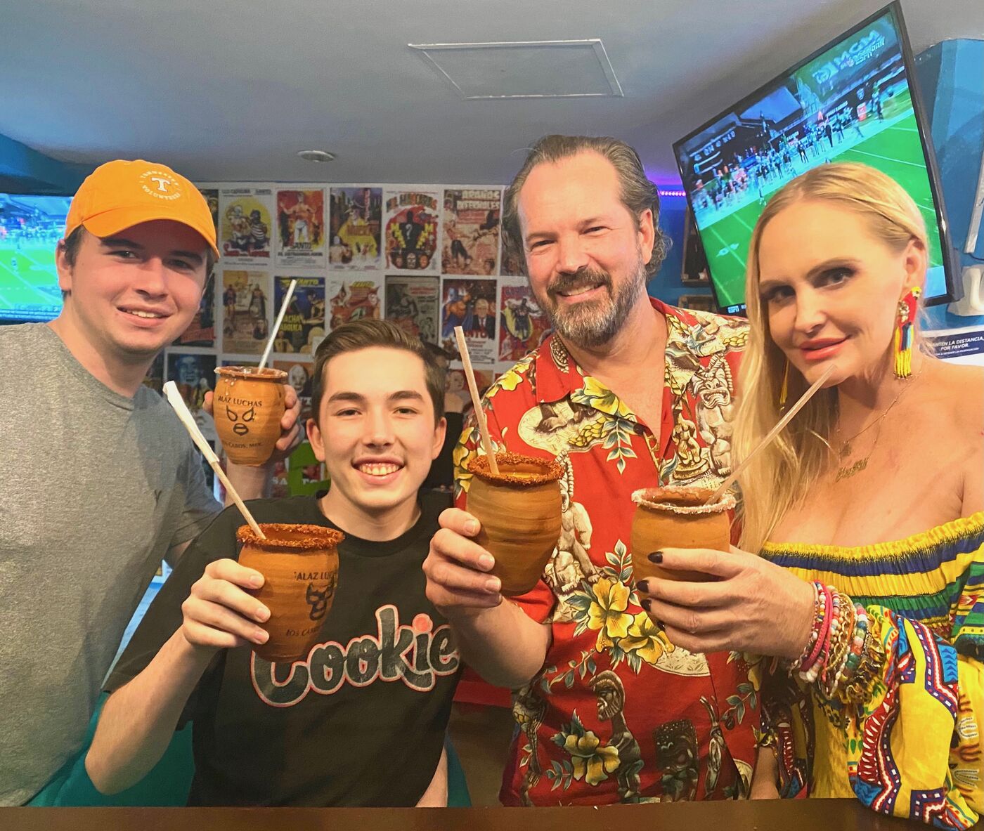 Steve, Meghan, Hank and Carter raising clay cups together